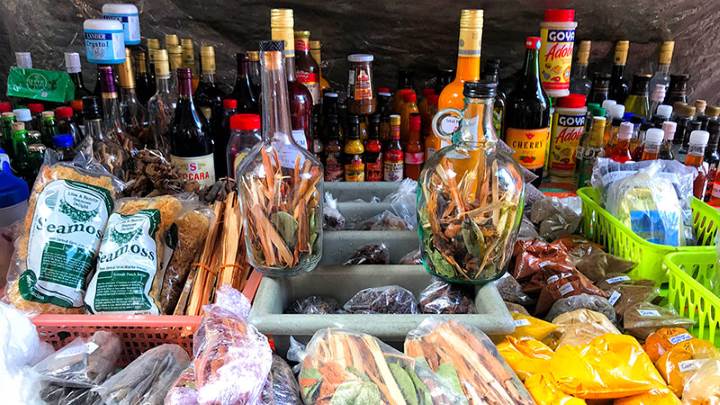 Local spices displayed on a vendor's tray at the Castries Market.