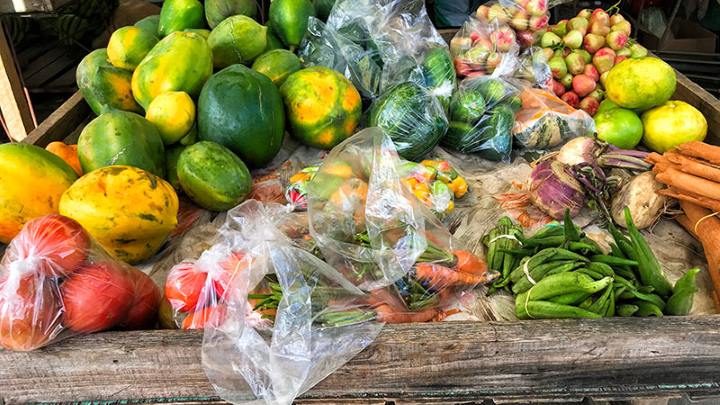 A vendor's tray with local fruits at the Castries Market.